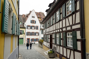 Narrow medieval street with traditional Bavarian houses in Bamberg, Bavaria, Franconia, Germany. November 2014