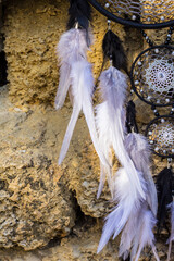 Handmade dream catcher with feathers threads and beads rope hanging