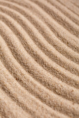 Sand Texture. Brown sand. Background from fine sand. Sand background.