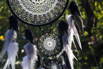 Handmade dream catcher with feathers threads and beads rope hanging