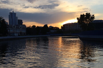 Fototapeta na wymiar MInsk city quayside with beautiful sunset view