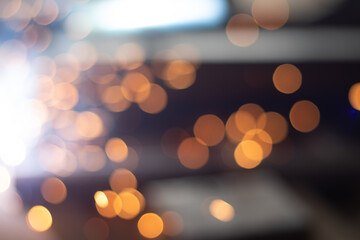 Fototapeta premium Gold abstract bokeh background, Festive xmas abstract background with bokeh defocused lights and stars