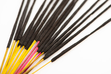 close up view of aroma sticks on white background