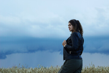 Alternative lifestyle of a woman on the meadow.