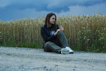 Alternative lifestyle of a woman on the meadow.