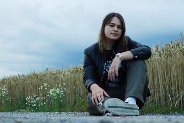 Alternative lifestyle of a woman on the meadow.