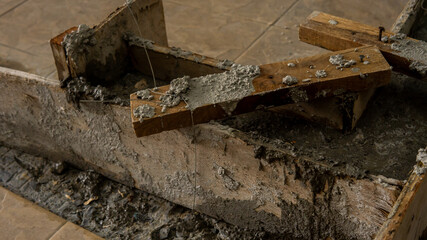Form work wall concrete using cement and wooden plank as frame.