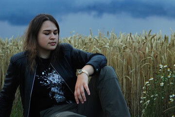 Alternative lifestyle of a woman on the meadow.