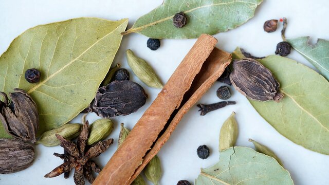 spices and herbs on light background