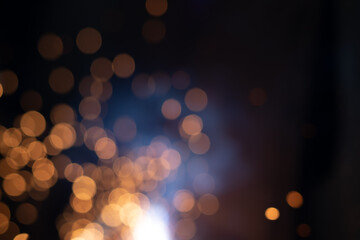 Gold abstract bokeh background, Festive xmas abstract background with bokeh defocused lights and stars