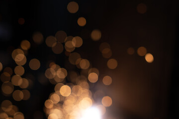 Gold abstract bokeh background, Festive xmas abstract background with bokeh defocused lights and stars