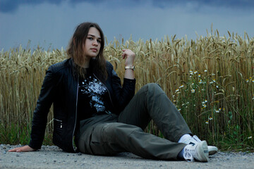 Alternative lifestyle of a woman on the meadow.