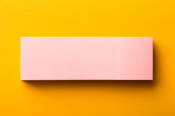 Blank Paper Isolated On Yellow Background