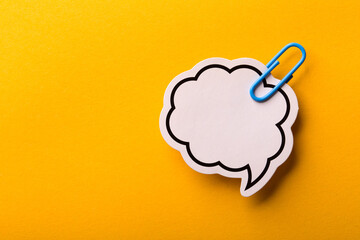 Blank Speech Bubble Paper Isolated On Yellow Background
