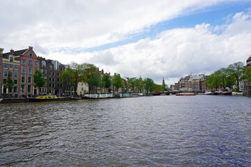 Fototapeta na wymiar Holland, Amsterdam, city views, navigation channels and monuments