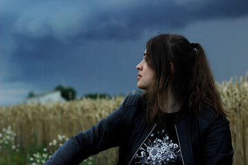 Alternative lifestyle of a woman on the meadow.