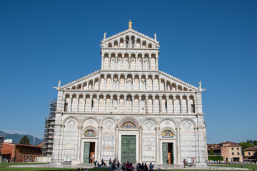 Fototapeta na wymiar Pisa Cathedral is a medieval Roman Catholic cathedral dedicated to the Assumption of the Virgin Mary, in the Piazza dei Miracoli in Pisa, Italy