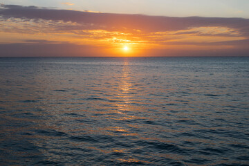 Naklejka na ściany i meble Beautiful sunrise over ocean in Zanzibar, Tanzania