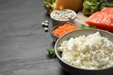 Products rich in protein on black table, closeup. Space for text