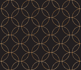 Fototapeta premium Gold glitter texture scattered circles over black background seamless pattern. Abstract golden sparkles of confetti.