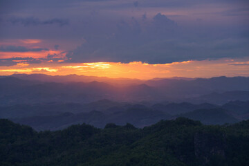 Heatwave hot sun. Climate Change. Global Warming.Beautiful landscape in the mountains at sunrise.Mountain Mist in sunrise,mist on sunrise,mist over mountain during sunrise