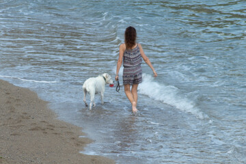 Girl Walking on the beach