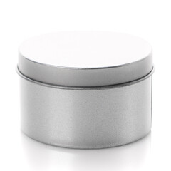 Round metal box close up isolated on white background.