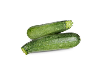 whole unpeeled fresh zucchini on white background