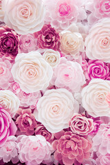 flower is made from corrugated paper, floral background in warm colors