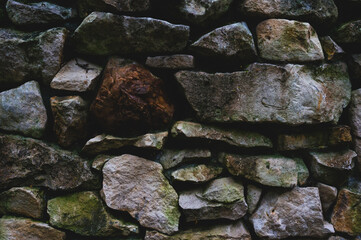 natural stone wall in dark colors