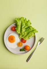 Healthy breakfast at green minimal background.