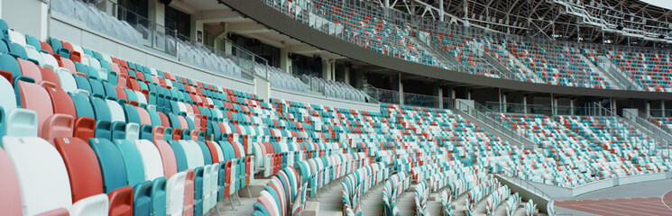 WIDE View of empty stadium seats before game or during Coronavirus COVID-19 pandemic © supamotion
