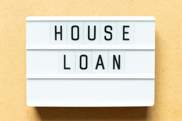 Lightbox with word house loan on wood background