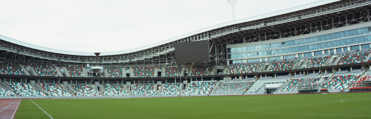 Fototapeta na wymiar WIDE View of empty stadium seats before game or during Coronavirus COVID-19 pandemic