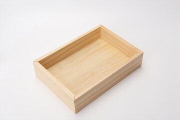 Rectangular wooden tea tray in a white background