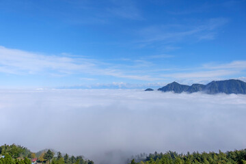 Beautiful foggy landscape of mountain and blue sky cloud.