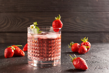Fresh strawberry cocktail with ripe strawberries and ice cubes.Strawberry lemonade.Close up.