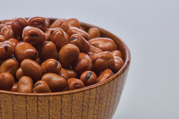 Fava beans (foul) shot on white background.
