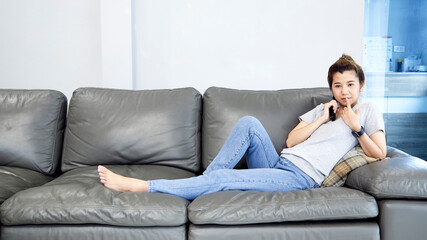 Woman at home watching tv