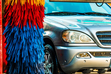 Car going through an automated car wash machine