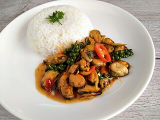 Mussels with basil on a plate that looks delicious