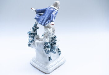 Porcelain figurine on a white background.