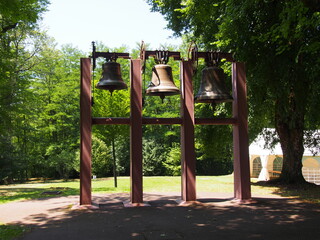 Fototapeta na wymiar Beautiful bell beside the Longchamp chapel on a sunny day