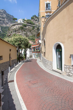 Typical narrow street in city of Positano, Italy