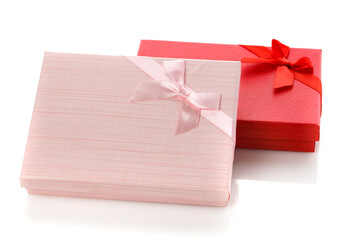 Two beautiful jewelry boxes. Red and pink gift box. Isolated on white background.