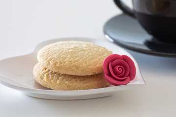 Delicious biscuits with hot coffee for breakfast.