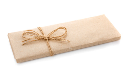 Box wrapped in kraft paper on a white background.