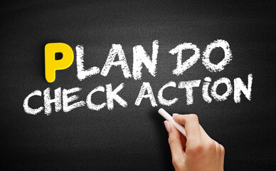 Plan Do Check Action text on blackboard, business concept background