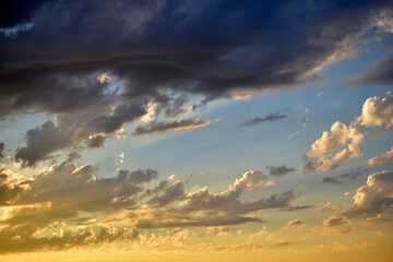 Blue sky with beautiful blue red clouds in the evening