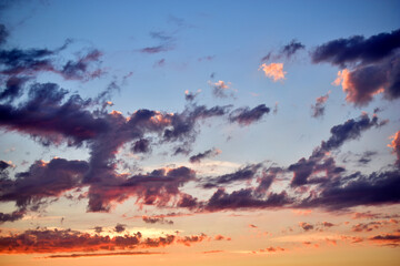 Blue sky with beautiful blue red clouds in the evening